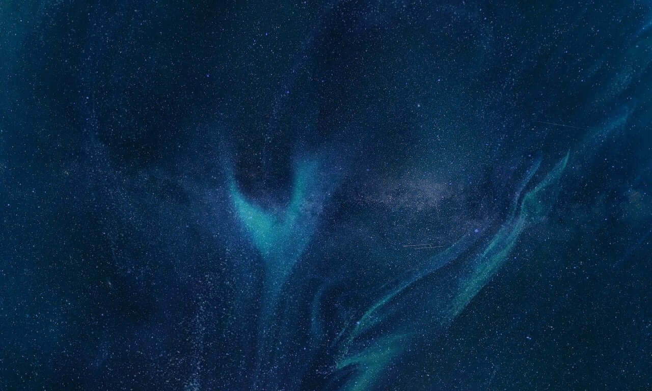 Image of deep space showing far away stars and planets in the distance