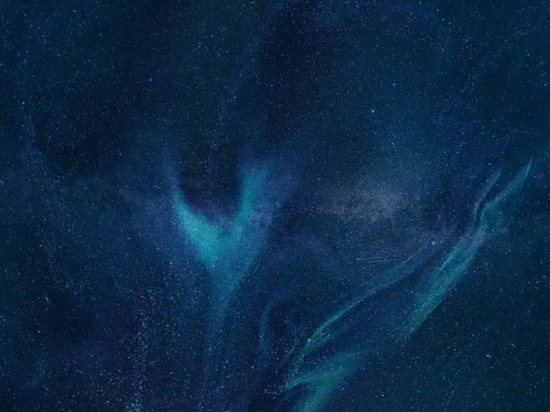 Image of deep space showing far away stars and planets in the distance