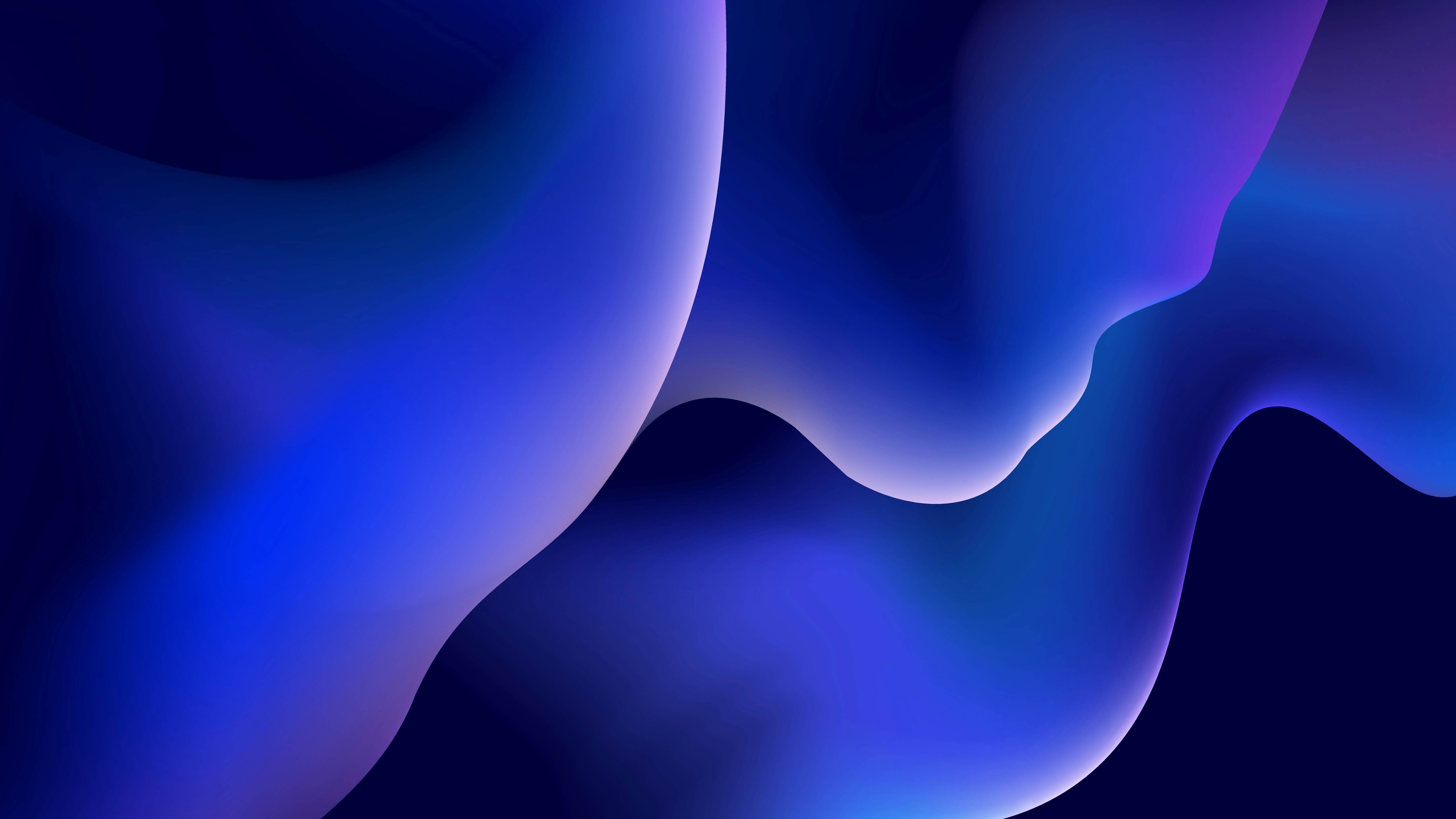 Abstract image of bright blue waves of colour against a dark background